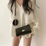 Fashion South Korea autumn new retro loose lazy style V-neck roll edge slit fashion pullover age reduction white sweater woman