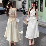 Summer Solid Color Casual Halter Cut-out Sleeveless Tassel Hem Holiday Beach Party Women Long Dress Black/White