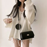 Fashion South Korea autumn new retro loose lazy style V-neck roll edge slit fashion pullover age reduction white sweater woman