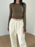 DERMEARNE Womens Long Sleeve Crop Tops Basic Slim Fitted Shirts Casual Fashion Solid Color 2024 Y2k Tops Teen Girl Clothes with Thumb Hole